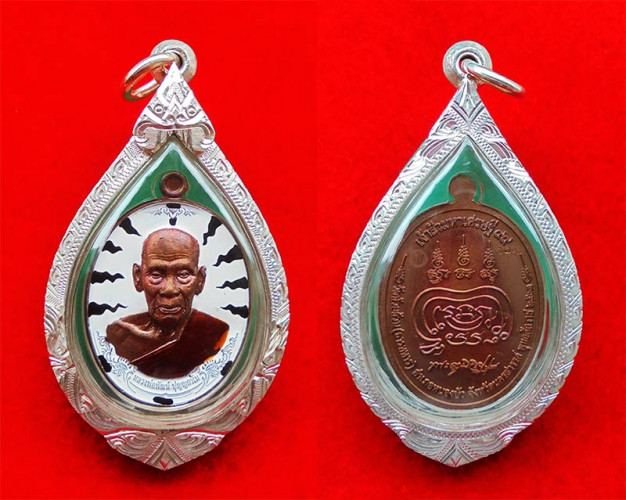 เหรียญหลวงพ่อพัฒน์ วัดห้วยด้วน รุ่นเจ้าสัวมหาเศรษฐี ๙๙ เนื้อมันปูลงยาเสือขาว ปี 2563 ตลับเงิน 4